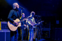 Paul Weller and guitarist Steve Cradock performing in London