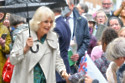 Queen Camilla braved the rain in Rye