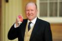 Sir Ian Livingstone knighted by Queen Elizabeth