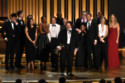 The Bear cast and crew accepting their Emmy Award