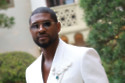 Usher suffered a neck injury which forced him to postpone three shows