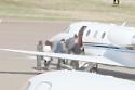 Zayn Malik boarding a private jet with family