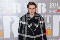 Brooklyn Beckham's parents support his photography dreams