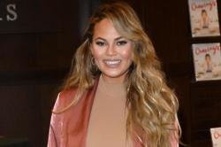 Chrissy Teigen would be Kim Kardashian West's surrogate