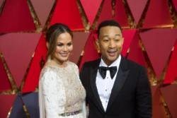 John Legend worried he'd wreck Chrissy Teigen's dress