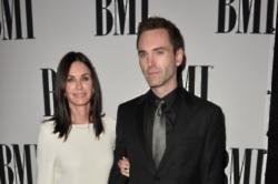 Courteney Cox and Johnny McDaid can't decide where to live