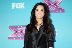 Demi Lovato Jokes About Meeting Paltrow