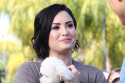 Demi Lovato 'Heartbroken' Following Death Of Dog Buddy