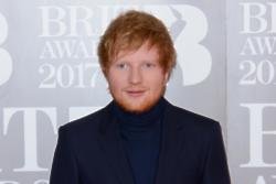 Ed Sheeran speaks to Maisie Williams before performing at BRITs