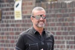 George Michael's boyfriend quizzed by police