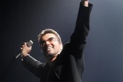 George Michael duets with Chris Martin at the BRITs