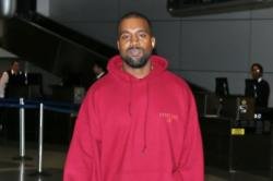 Kanye West delays gigs to be with Kim Kardashian West