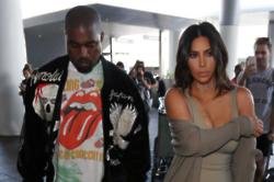 Kim Kardashian West pampers Kanye after shows