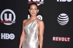 Kate Hudson is reluctant to leave her family for work