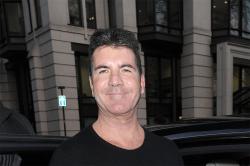 Simon Cowell says working with a children's charity has changed his life