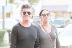 Simon Cowell will be in the delivery room for the birth