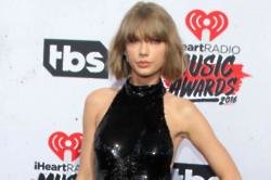Taylor Swift Gushes over Calvin Harris at iHeartRadio Awards