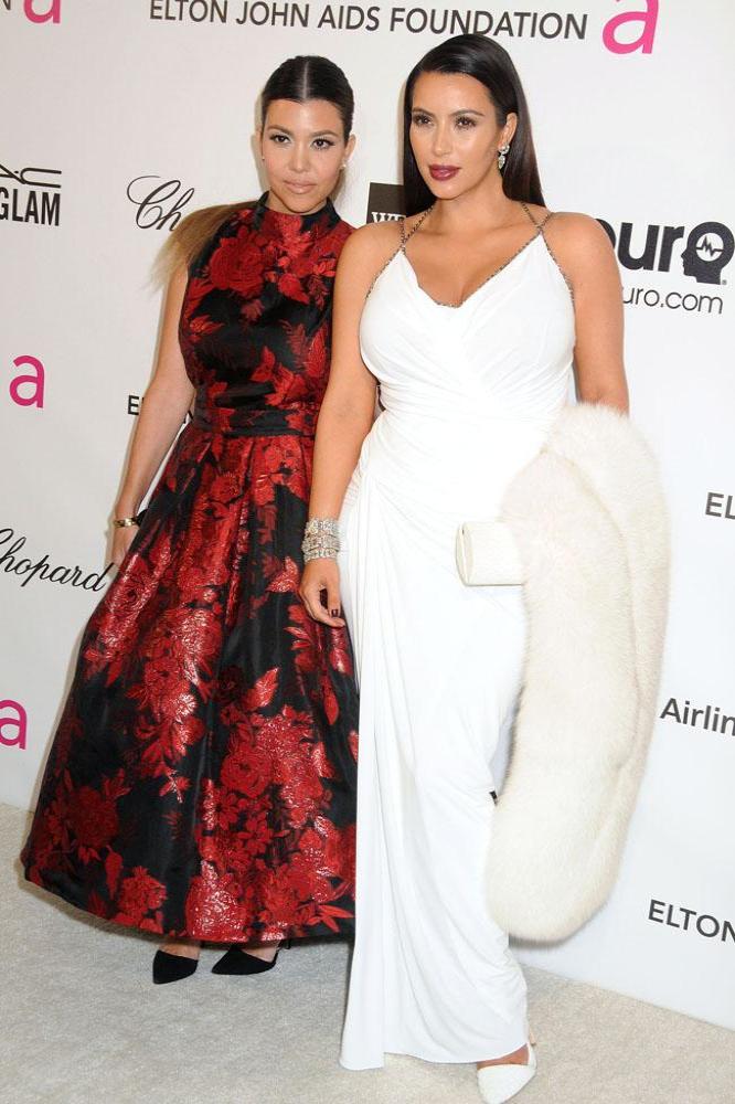 Kim Kardashian Gives Sister Kourtney Relationship Advice