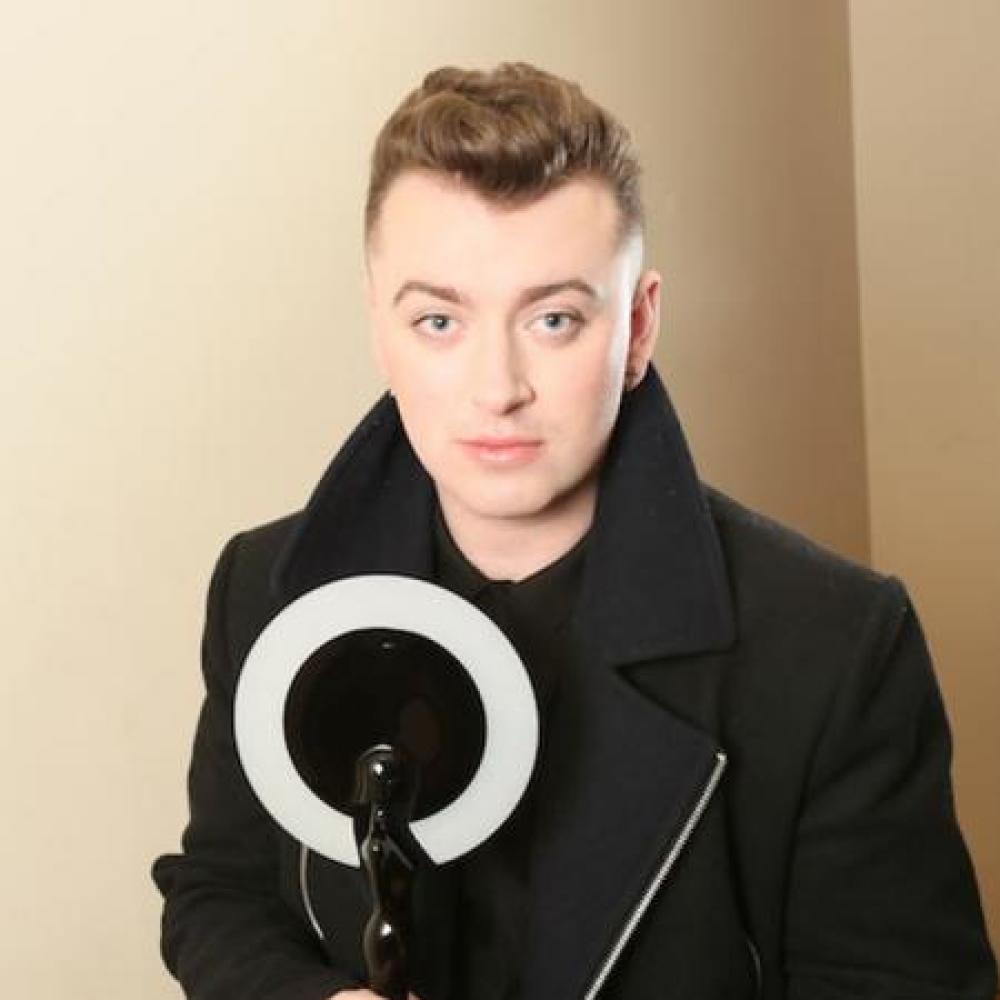 Sam Smith with his BRIT Award