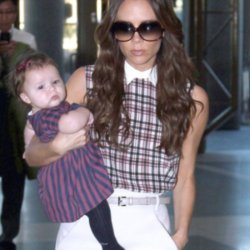 Victoria Beckham with Harper in the airport