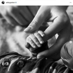 Ashley Graham holds baby son's hand (c) Instagram 