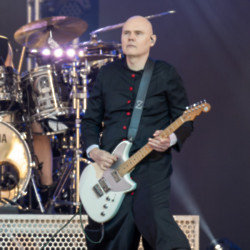 Billy Corgan considered giving up the guitar after his father's death