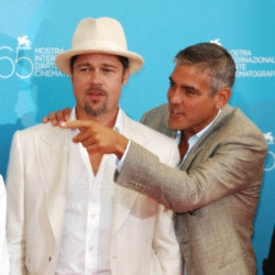 Brad Pitt jokes he had to pick George Clooney as the 'most handsome man' of now