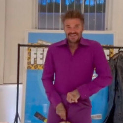 David Beckham ripped his purple wedding suit as he and his wife recreated their looks from the big day to mark the 25th anniversary of their nuptials