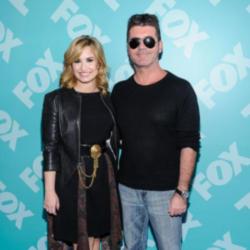 Simon Cowell and Demi Lovato