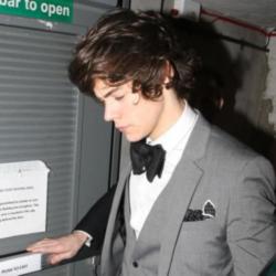 Harry Styles wearing bow tie after 2012 BRITs