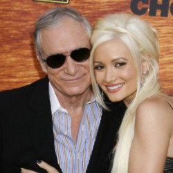 Holly Madison found Pamela Anderson 'awkward' whenever she was in the company of Hugh Hefner