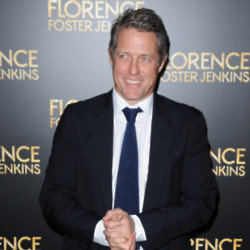 Hugh Grant doesn't get any pleasure from watching himself back