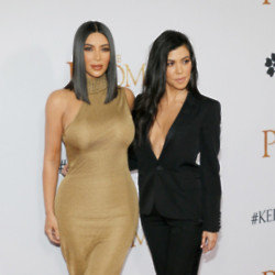 Kourtney Kardashian and Kim Kardashian insist the are on really good terms