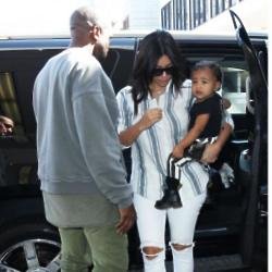 Kim Kardashian West, Kanye West and North West at LAX