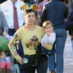 Kourtney Kardashian with Mason at Disneyland