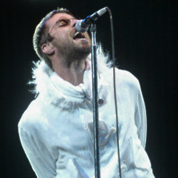 Liam Gallagher performing with Oasis at the 2004 Glastonbury Festival