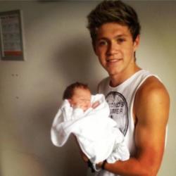 Niall Horan with baby Theo