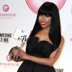 Nicki Minaj with the Best Hip Hop award at the 2014 MTV EMAs