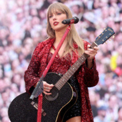 Taylor Swift performing at Wembley Stadium