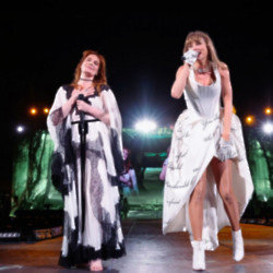 Taylor Swift performs with Florence Welch at London's Wembley Stadium