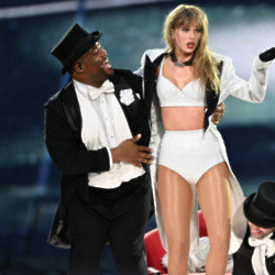 Taylor Swift's tour dancer Kam Saunders is ok after taking a nasty tumble on stage