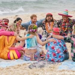 The Duchess of Sussex and Prince Harry on Bondi Beach