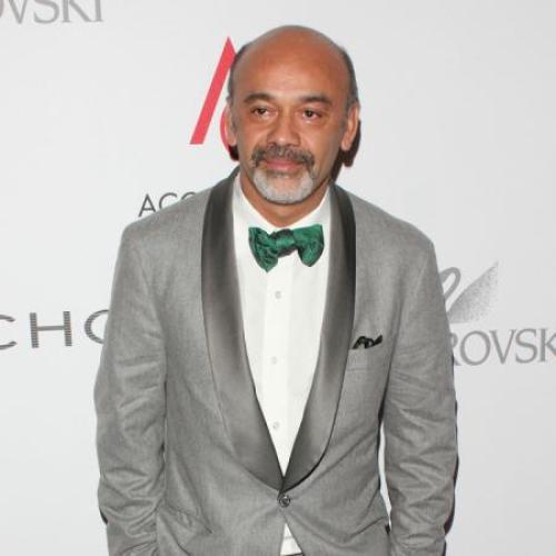 Surprise! Christian Louboutin is the father of two-year-old twins