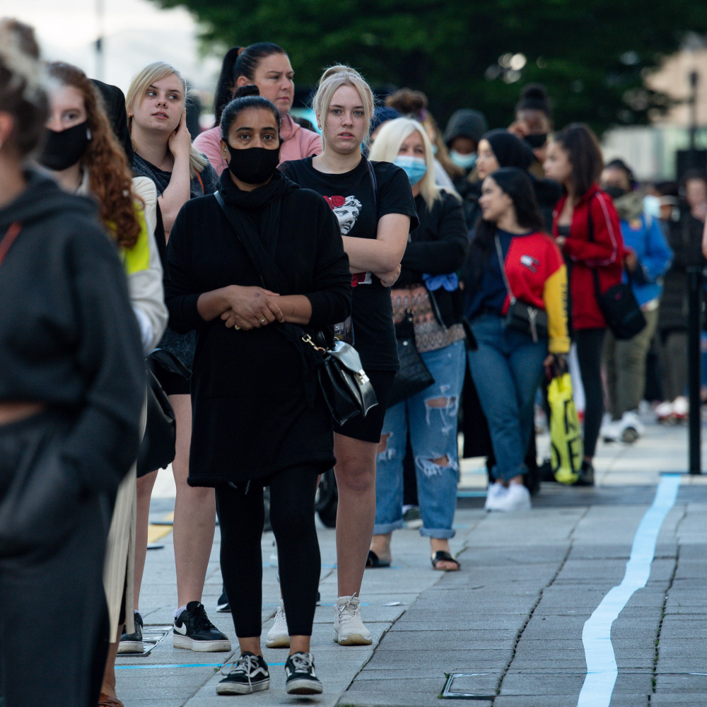 Shoppers queueing outside Primark in Birmingham as non-essential stores reopen on June 15