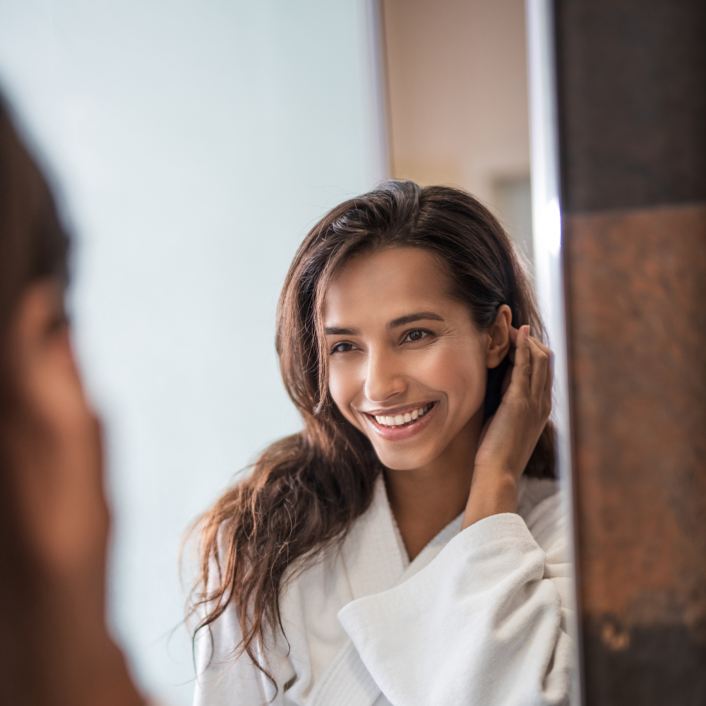 Woman looking in the mirror