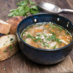 Organic chicken soup with tarragon garlic bread