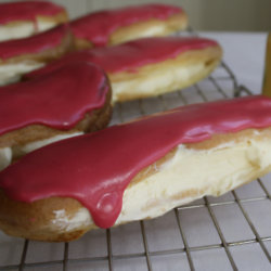 Lemon Curd Éclairs With Raspberry Icing