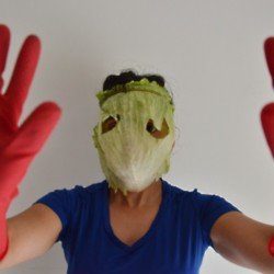 A woman wears a lettuce face mask in Mexico City / Credit: PA