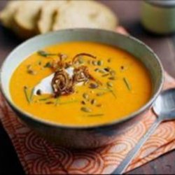 Shallot, Pumpkin and Red Pepper Soup with Candied Shallot and Pumpkin Seeds served with Low Fat Crème Fraiche